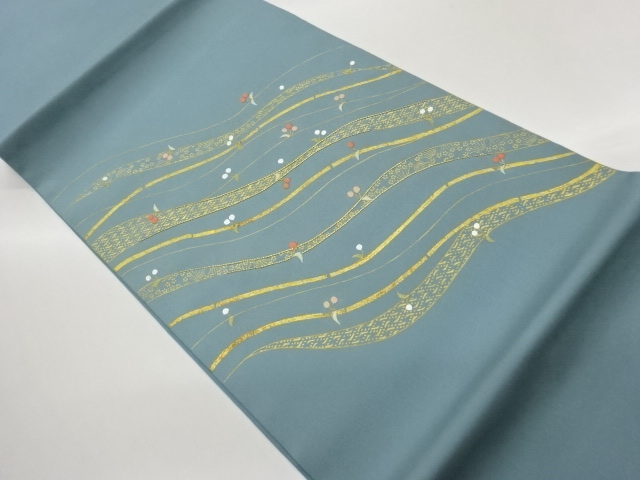 塩瀬金駒刺繍曲線に実模様名古屋帯